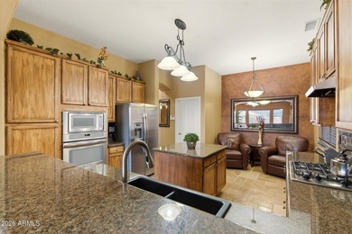 Just steps from the award-winning Wildfire Golf Course, this on Wildfire Golf Club in Arizona - for sale on GolfHomes.com, golf home, golf lot