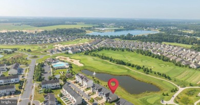 Welcome to this stunning 4-bedroom, 2.5-bathroom end unit on Plantation Lakes Golf and Country Club in Delaware - for sale on GolfHomes.com, golf home, golf lot