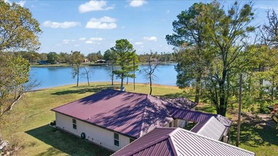This well-appointed 3-bedroom, 2-bath waterfront home is on Clarksville Country Club in Texas - for sale on GolfHomes.com, golf home, golf lot