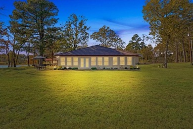 This well-appointed 3-bedroom, 2-bath waterfront home is on Clarksville Country Club in Texas - for sale on GolfHomes.com, golf home, golf lot