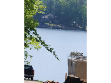 Welcome to your beautiful dream home with a waterview and the on River Golf and County Club at Lake Royale in North Carolina - for sale on GolfHomes.com, golf home, golf lot