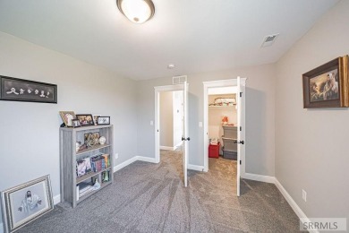 Stunning home nestled in a quiet, secluded neighborhood right on Idaho Falls Country Club in Idaho - for sale on GolfHomes.com, golf home, golf lot