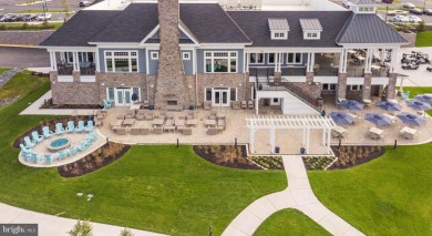 Welcome to this stunning 4-bedroom, 2.5-bathroom end unit on Plantation Lakes Golf and Country Club in Delaware - for sale on GolfHomes.com, golf home, golf lot