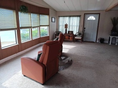 Location, location, location !   2/2 in the sought after Lake on Pine Lakes Country Club in Florida - for sale on GolfHomes.com, golf home, golf lot