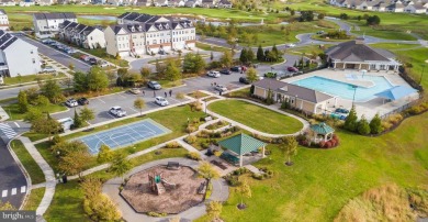 Welcome to this stunning 4-bedroom, 2.5-bathroom end unit on Plantation Lakes Golf and Country Club in Delaware - for sale on GolfHomes.com, golf home, golf lot