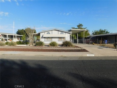 Welcome to 13804 Trinidad Dr. Victorville.  This little beauty on Green Tree Golf Course in California - for sale on GolfHomes.com, golf home, golf lot