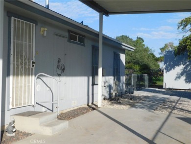 Welcome to 13804 Trinidad Dr. Victorville.  This little beauty on Green Tree Golf Course in California - for sale on GolfHomes.com, golf home, golf lot