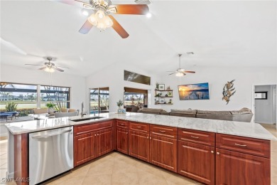 Luxurious lakefront pool home where you'll enjoy scenic golf on Royal Tee Country Club in Florida - for sale on GolfHomes.com, golf home, golf lot