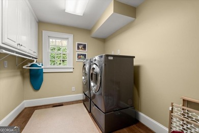 Tucked near a quiet cul-de-sac in the prestigious Atlanta on Atlanta Country Club in Georgia - for sale on GolfHomes.com, golf home, golf lot