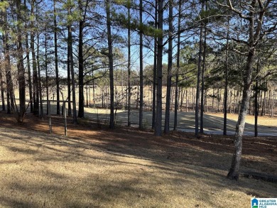 This exquisite home, located with a prime view overlooking the on Ballantrae Golf Club in Alabama - for sale on GolfHomes.com, golf home, golf lot