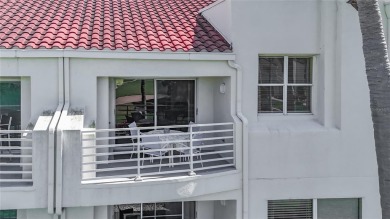 Welcome Home!  This amazing second-floor condo is located in on Isla Del Sol Yacht and Country Club in Florida - for sale on GolfHomes.com, golf home, golf lot