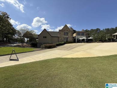 This exquisite home, located with a prime view overlooking the on Ballantrae Golf Club in Alabama - for sale on GolfHomes.com, golf home, golf lot