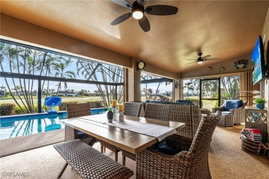 Luxurious lakefront pool home where you'll enjoy scenic golf on Royal Tee Country Club in Florida - for sale on GolfHomes.com, golf home, golf lot