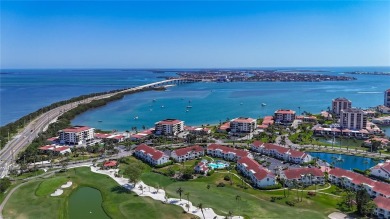 Welcome Home!  This amazing second-floor condo is located in on Isla Del Sol Yacht and Country Club in Florida - for sale on GolfHomes.com, golf home, golf lot
