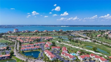 Welcome Home!  This amazing second-floor condo is located in on Isla Del Sol Yacht and Country Club in Florida - for sale on GolfHomes.com, golf home, golf lot