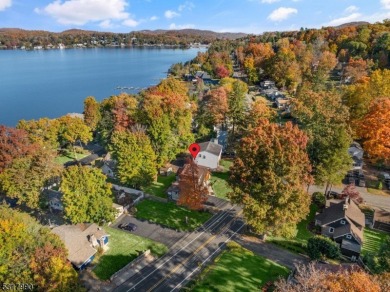 Location, location, location! This 2024 renovated Lake Mohawk on Lake Mohawk Golf Club in New Jersey - for sale on GolfHomes.com, golf home, golf lot