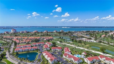 Welcome Home!  This amazing second-floor condo is located in on Isla Del Sol Yacht and Country Club in Florida - for sale on GolfHomes.com, golf home, golf lot