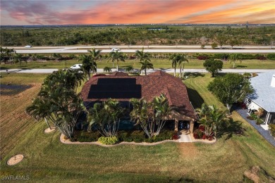 Luxurious lakefront pool home where you'll enjoy scenic golf on Royal Tee Country Club in Florida - for sale on GolfHomes.com, golf home, golf lot