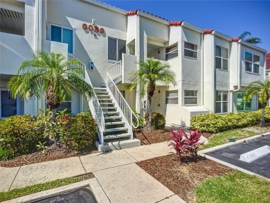 Welcome Home!  This amazing second-floor condo is located in on Isla Del Sol Yacht and Country Club in Florida - for sale on GolfHomes.com, golf home, golf lot
