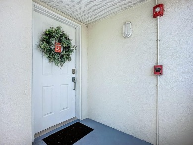 Welcome Home!  This amazing second-floor condo is located in on Isla Del Sol Yacht and Country Club in Florida - for sale on GolfHomes.com, golf home, golf lot