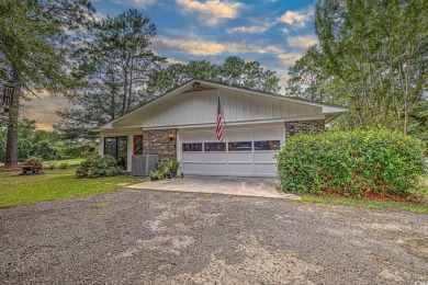 Charming All-Brick Home with NO HOA and a HUGE LOT. This on The Founders Club At Pawleys Island in South Carolina - for sale on GolfHomes.com, golf home, golf lot