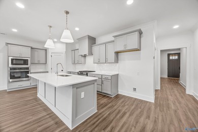 This beautifully crafted residence features an open floor plan on Canebrake Golf Club in Alabama - for sale on GolfHomes.com, golf home, golf lot