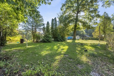 Not just your everyday cottage!  This cute off-water bungalow is on Cedar Lake Golf Course in Indiana - for sale on GolfHomes.com, golf home, golf lot