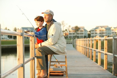 This cottage home is being sold Fully Furnished (minus a few on Members Club At St. James Plantation in North Carolina - for sale on GolfHomes.com, golf home, golf lot