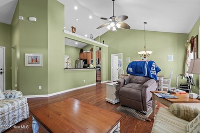 Experience the perfect blend of comfort and golf course living on Meadowlands Golf Club in North Carolina - for sale on GolfHomes.com, golf home, golf lot