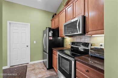 Experience the perfect blend of comfort and golf course living on Meadowlands Golf Club in North Carolina - for sale on GolfHomes.com, golf home, golf lot