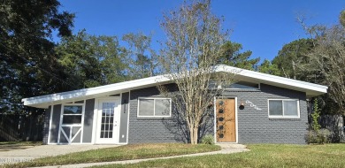 **Charming Mid-Century Modern Home in Ocean Springs**Welcome to on Gulf Hills Golf Club in Mississippi - for sale on GolfHomes.com, golf home, golf lot