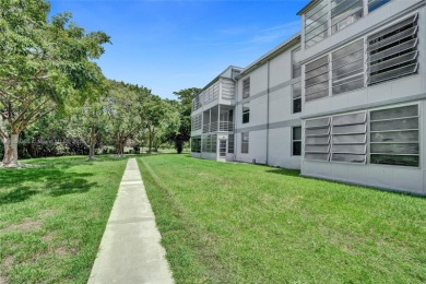 This spacious 2-bedroom, 2-bathroom condo in Tamarac's desirable on Colony West Country Club in Florida - for sale on GolfHomes.com, golf home, golf lot