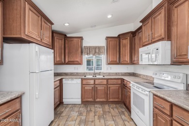 Enjoy comfort and convenience in this lovely 2-bedroom on Viewpoint Golf Resort in Arizona - for sale on GolfHomes.com, golf home, golf lot