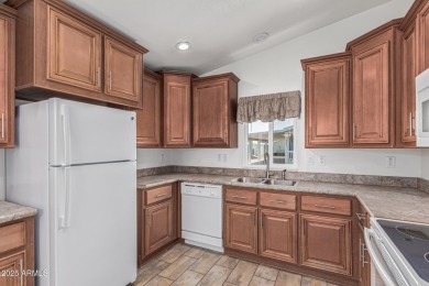 Enjoy comfort and convenience in this lovely 2-bedroom on Viewpoint Golf Resort in Arizona - for sale on GolfHomes.com, golf home, golf lot
