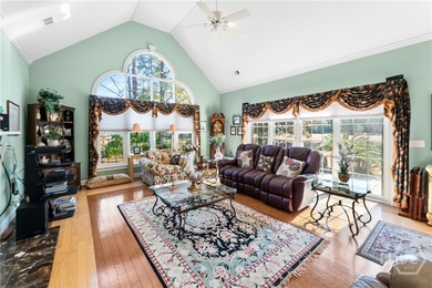 Beautiful brick 4-bedroom, 3.5-bath home overlooking a tranquil on Southbridge Golf Club in Georgia - for sale on GolfHomes.com, golf home, golf lot