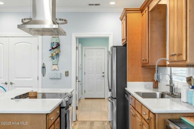 Experience the perfect blend of coastal charm and golf course on Lockwood Folly Country Club in North Carolina - for sale on GolfHomes.com, golf home, golf lot