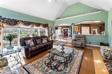 Beautiful brick 4-bedroom, 3.5-bath home overlooking a tranquil on Southbridge Golf Club in Georgia - for sale on GolfHomes.com, golf home, golf lot