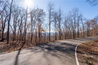 Discover the perfect blend of tranquility and breathtaking views on Big Canoe Golf Club - Cherokee in Georgia - for sale on GolfHomes.com, golf home, golf lot