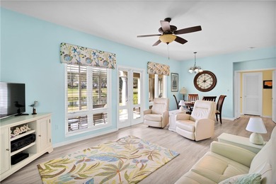 This 2 bedroom, 2 bath Harmony Island condo is Florida living at on Oak Harbor Country Club in Florida - for sale on GolfHomes.com, golf home, golf lot