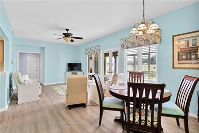 This 2 bedroom, 2 bath Harmony Island condo is Florida living at on Oak Harbor Country Club in Florida - for sale on GolfHomes.com, golf home, golf lot
