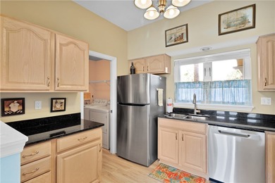 This 2 bedroom, 2 bath Harmony Island condo is Florida living at on Oak Harbor Country Club in Florida - for sale on GolfHomes.com, golf home, golf lot