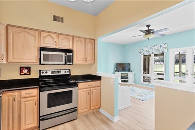 This 2 bedroom, 2 bath Harmony Island condo is Florida living at on Oak Harbor Country Club in Florida - for sale on GolfHomes.com, golf home, golf lot