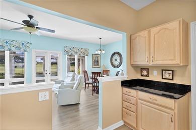 This 2 bedroom, 2 bath Harmony Island condo is Florida living at on Oak Harbor Country Club in Florida - for sale on GolfHomes.com, golf home, golf lot