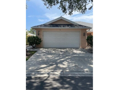 This 2-bedroom, 2-bathroom home with a split floor plan offers on The Golf Club of Jupiter in Florida - for sale on GolfHomes.com, golf home, golf lot