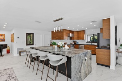 An exceptional opportunity to own a beautifully renovated on Coral Ridge Country Club in Florida - for sale on GolfHomes.com, golf home, golf lot