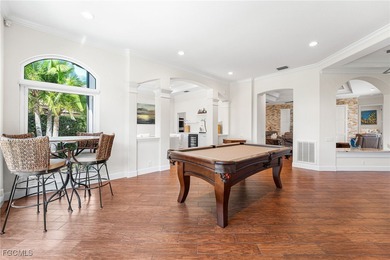 Nestled within Gulf Harbour-one of Southwest Florida's premier on Gulf Harbour Yacht and Country Club in Florida - for sale on GolfHomes.com, golf home, golf lot