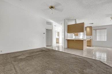 This 2-bedroom, 2-bathroom home with a split floor plan offers on The Golf Club of Jupiter in Florida - for sale on GolfHomes.com, golf home, golf lot