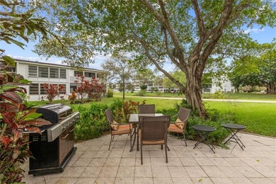 BEAUTIFULLY REMODELED, FIRST FLOOR 2 BEDROOM, 1.5 BATH CONDO on Hillsboro Pines Golf in Florida - for sale on GolfHomes.com, golf home, golf lot