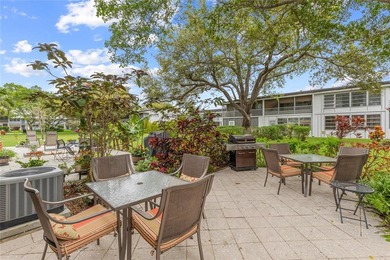 BEAUTIFULLY REMODELED, FIRST FLOOR 2 BEDROOM, 1.5 BATH CONDO on Hillsboro Pines Golf in Florida - for sale on GolfHomes.com, golf home, golf lot