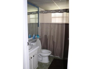 Welcome to your new home in Kings Point!This bright and spacious on Addison Reserve in Florida - for sale on GolfHomes.com, golf home, golf lot